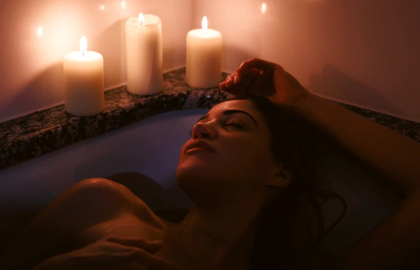 Boudoir photograph of woman lying on a kitchen counter