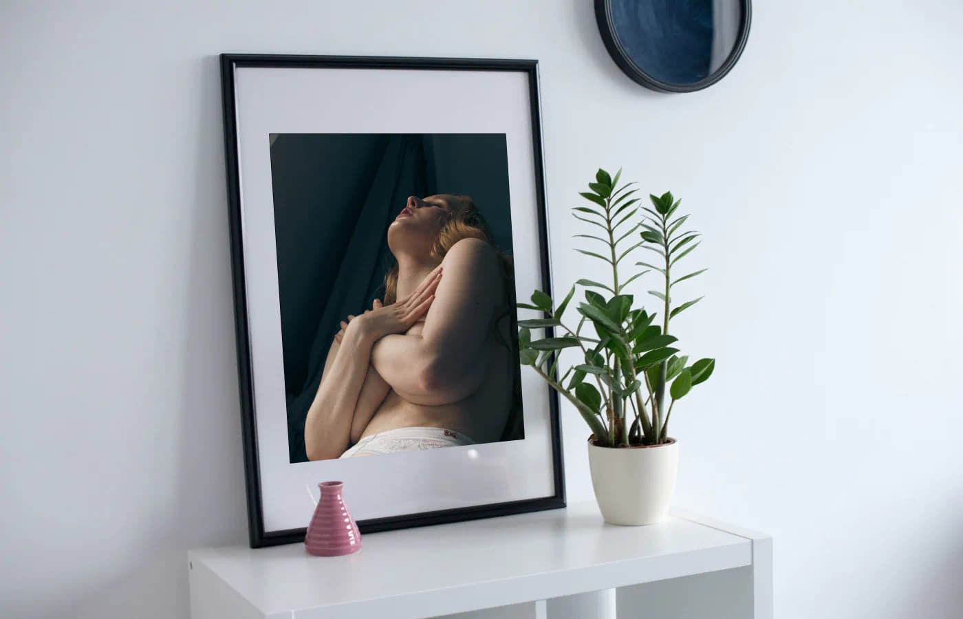 Boudoir photograph of woman lying on a kitchen counter